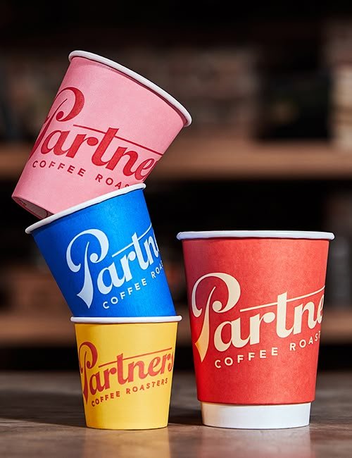 Custom-printed double-wall paper cups in several colours